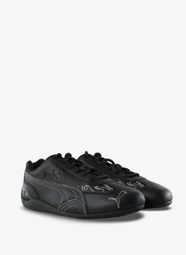 Black Slim Low-Top Sneakers with White Contrast Stitching & Swirl Details