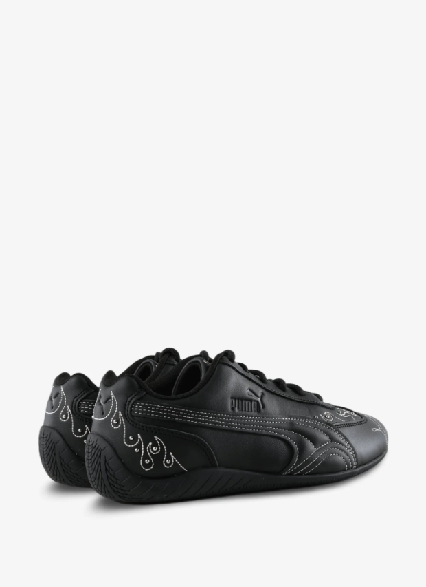 Black Slim Low-Top Sneakers with White Contrast Stitching & Swirl Details